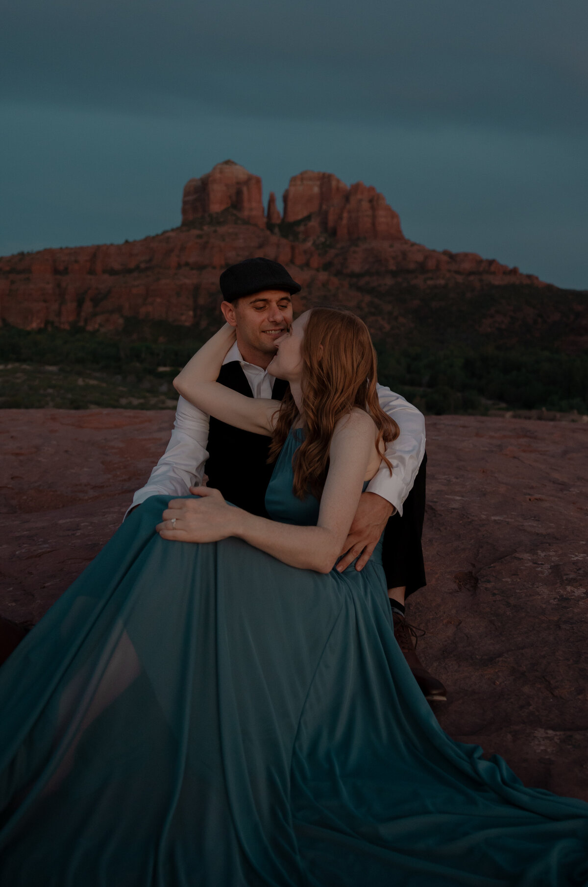 Sunset engagement photo in Sedona with golden Arizona light