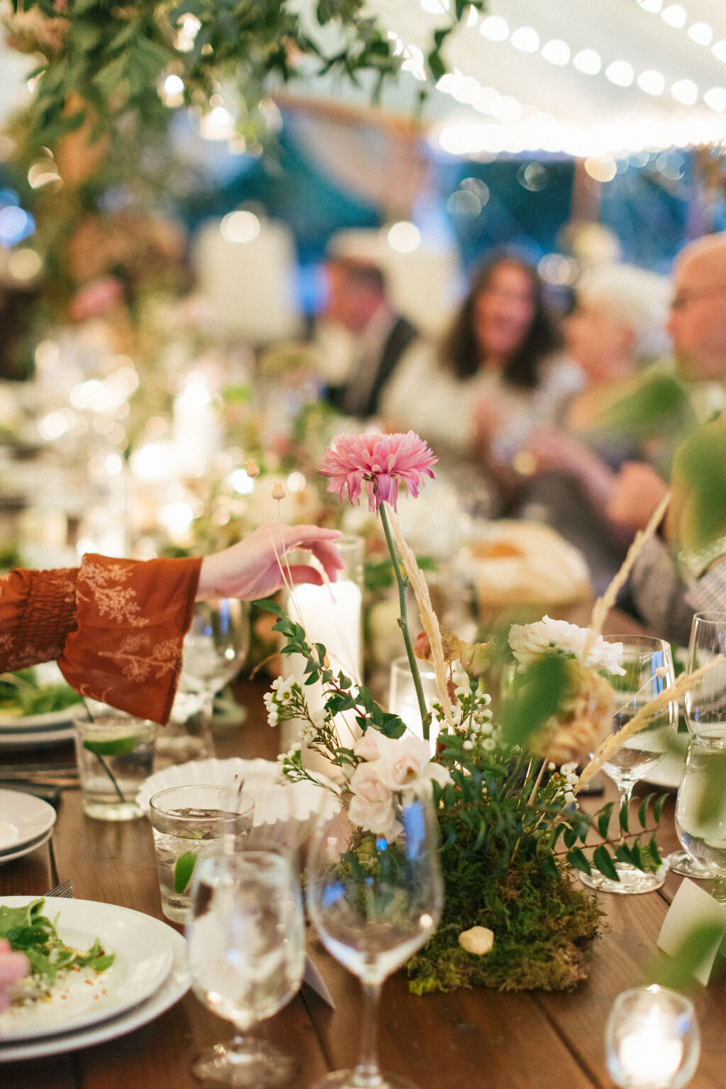 Romantic autumn floral centerpiece with candles, garden roses and lush natural greenery. Wedding floral design at RT Lodge by Rosemary and Finch in Nashville, TN.