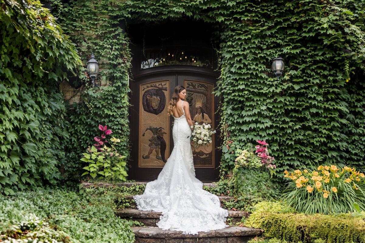 Bride poses for a portrait at the Montebello Estate wedding venue in Lemont, Illinois. Photo Taken by Austin Wedding Photographers, Joanna & Brett