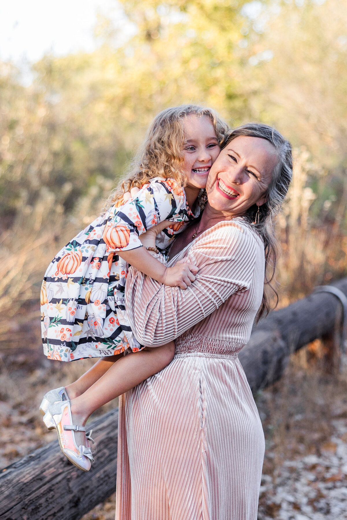 grandmother holding granddaughter mission trails