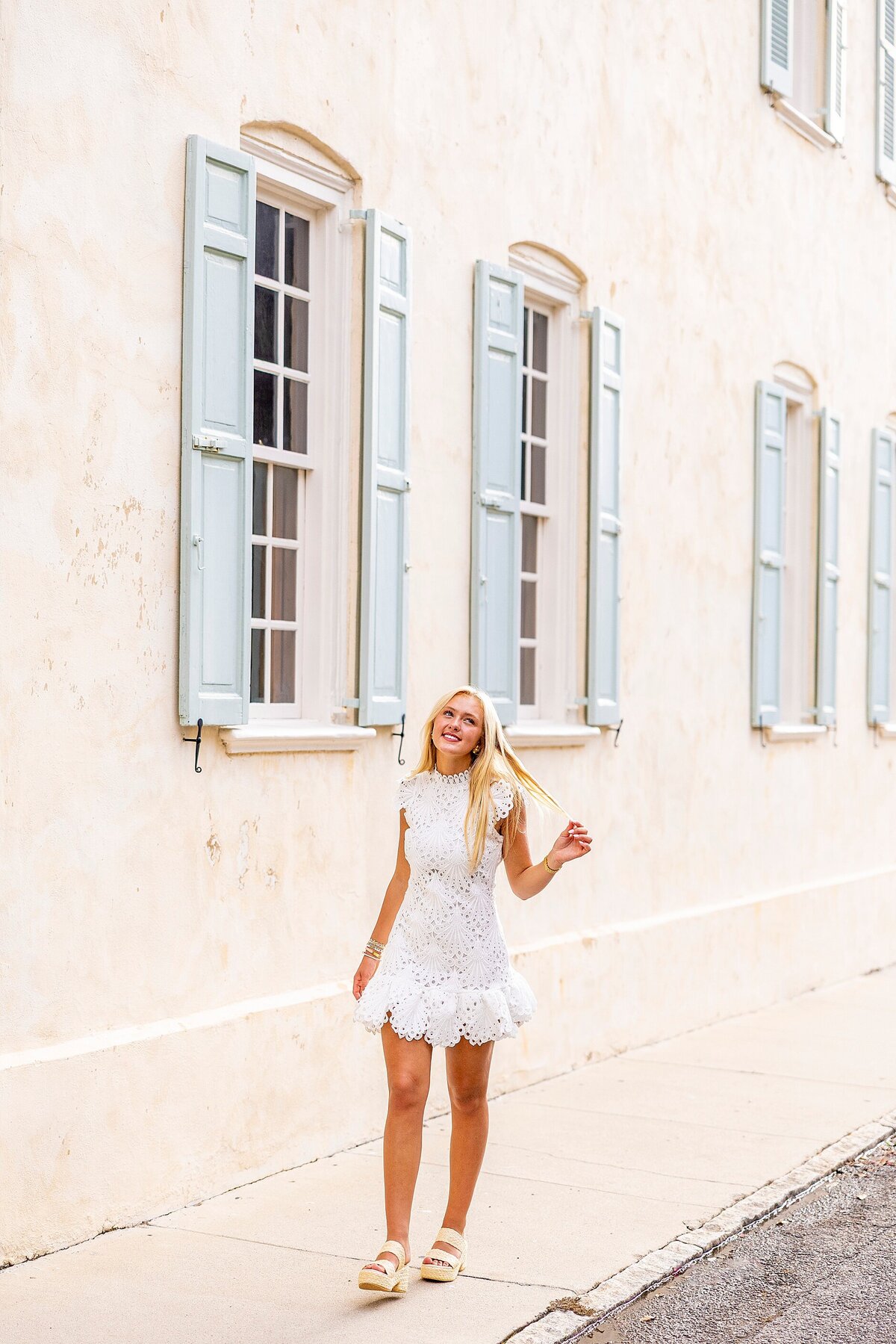 Charleston high school senior portrait in historic streets, capturing authentic personality and timeless elegance