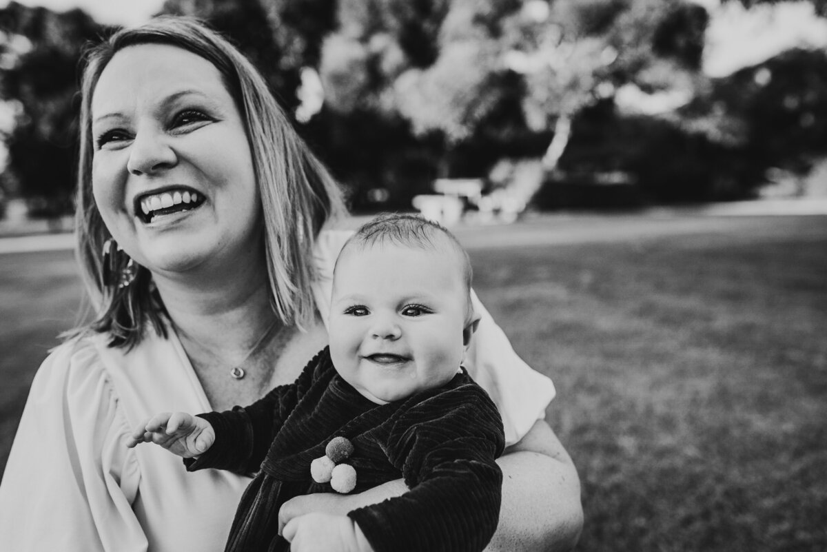 lifestyle family photography Perth session - outdoors mum and her baby both laughing