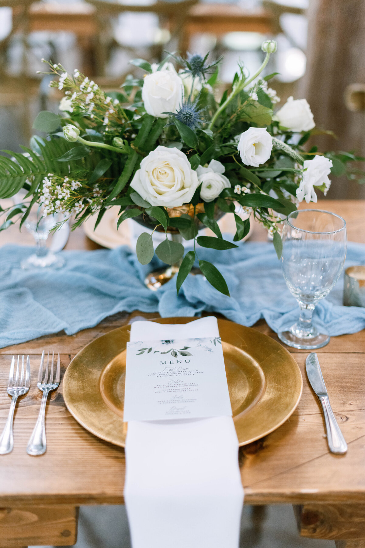 rustic wedding tablescape with gold charger