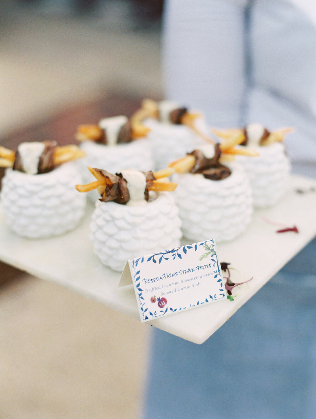 The photo was taken at The Hamptons, New York, waterfront estate tented wedding by photographer Bonnie Sen.