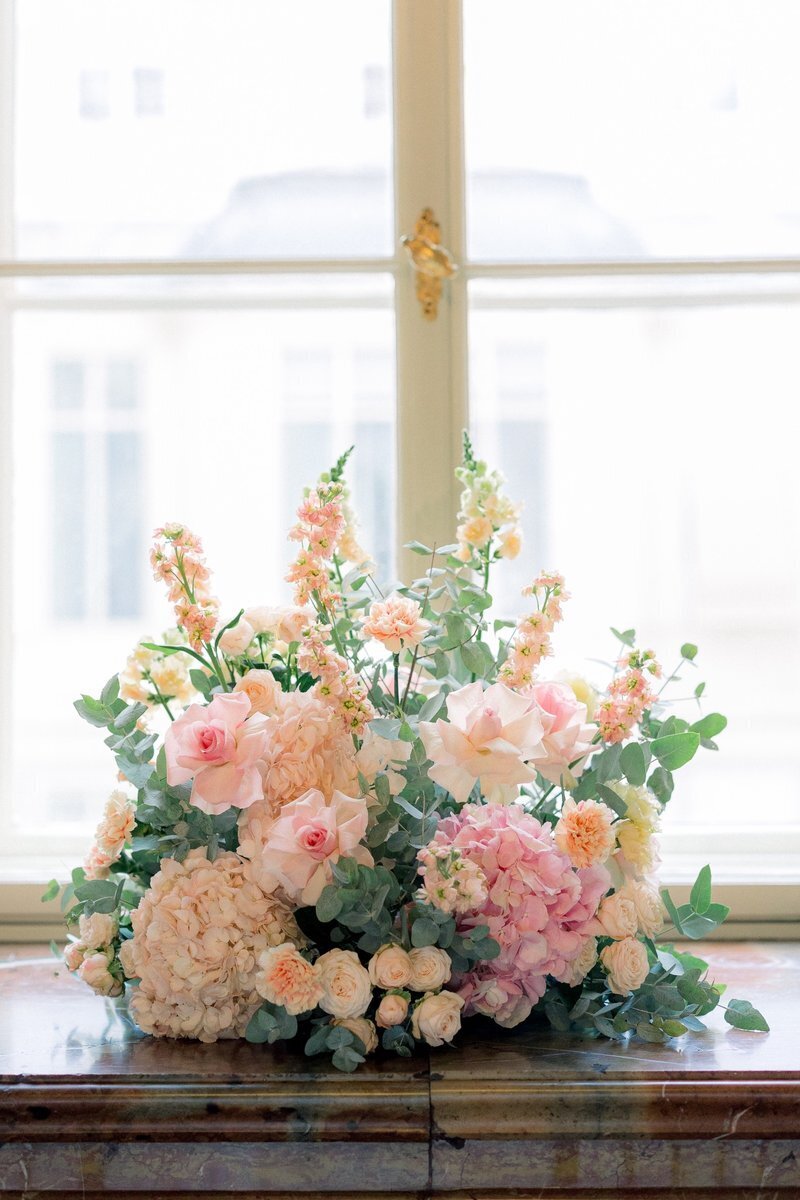 Close up of wedding flower arrangements at palace Daun Kinsky designed and executed by ECLAT Destination Weddings