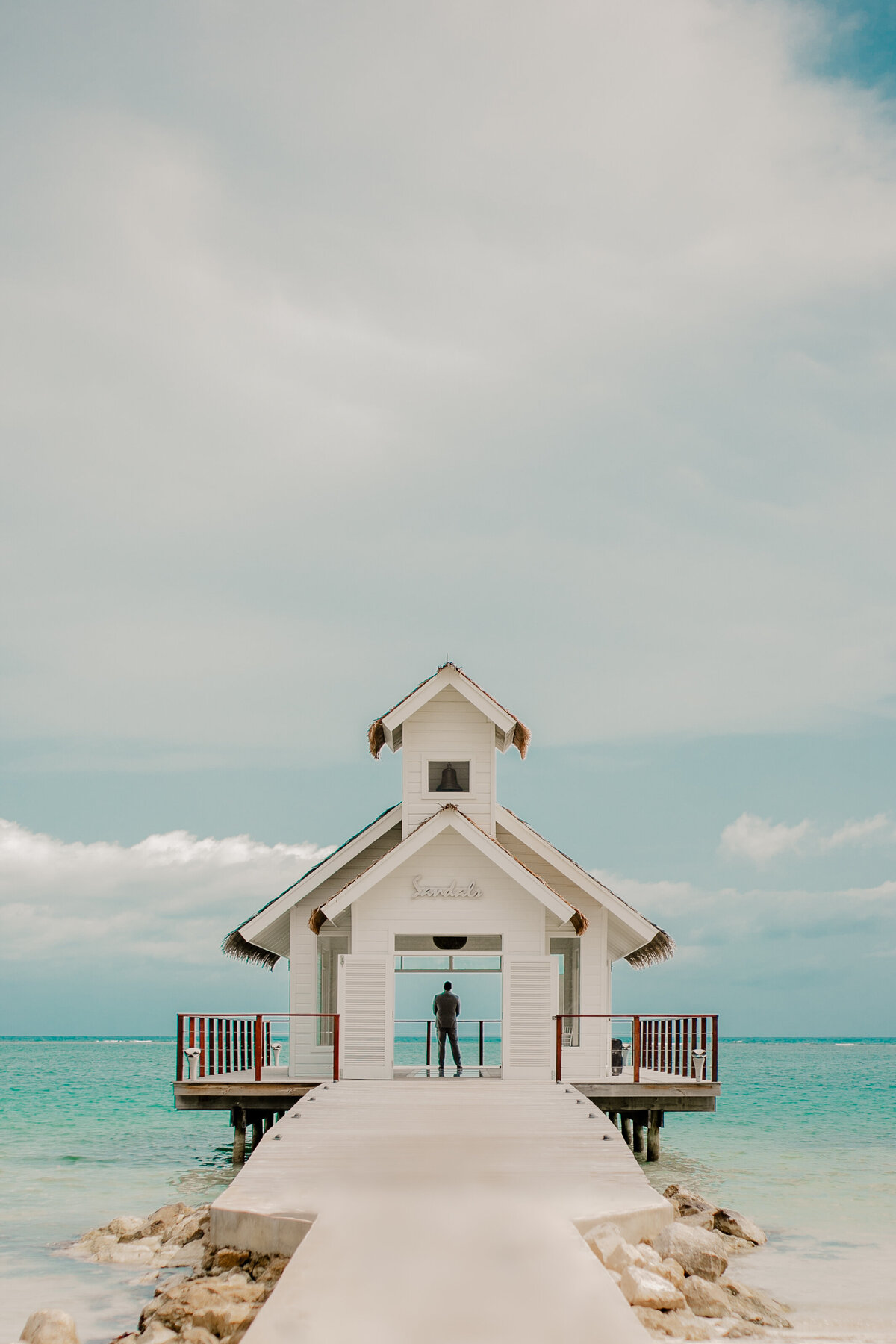 Bride and groom in Jamaica at Sandals Resorts at sunset – destination wedding photography by Tori Nichole Photography.