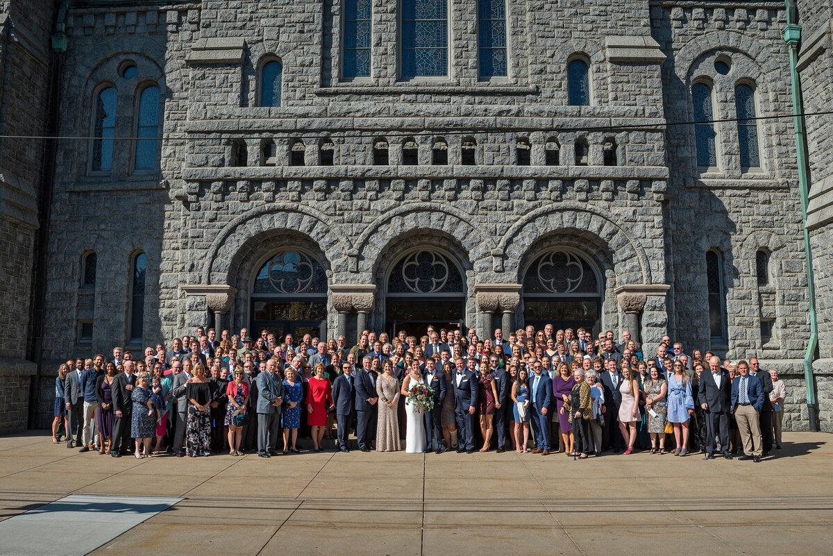 Large group photo by photographer outside Saint Patrick Church in Erie PA.