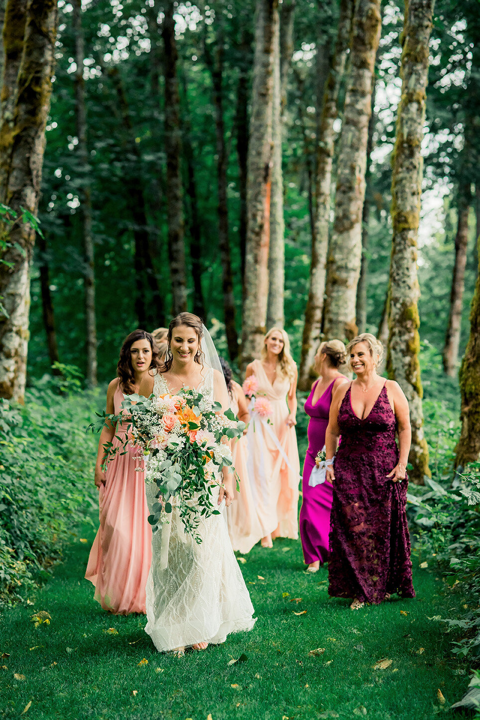 bridesmaids and bride walking