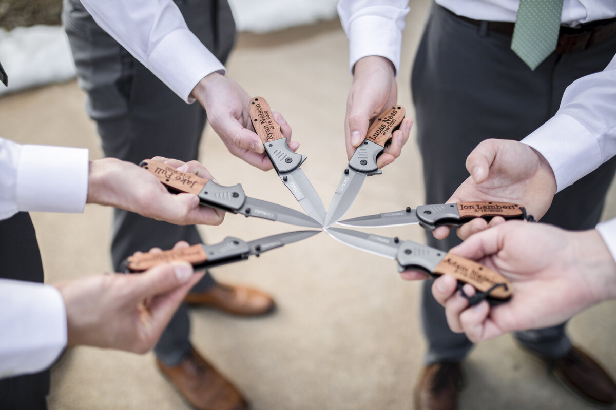 inter wedding with groomsmen gifts all knives with names on them