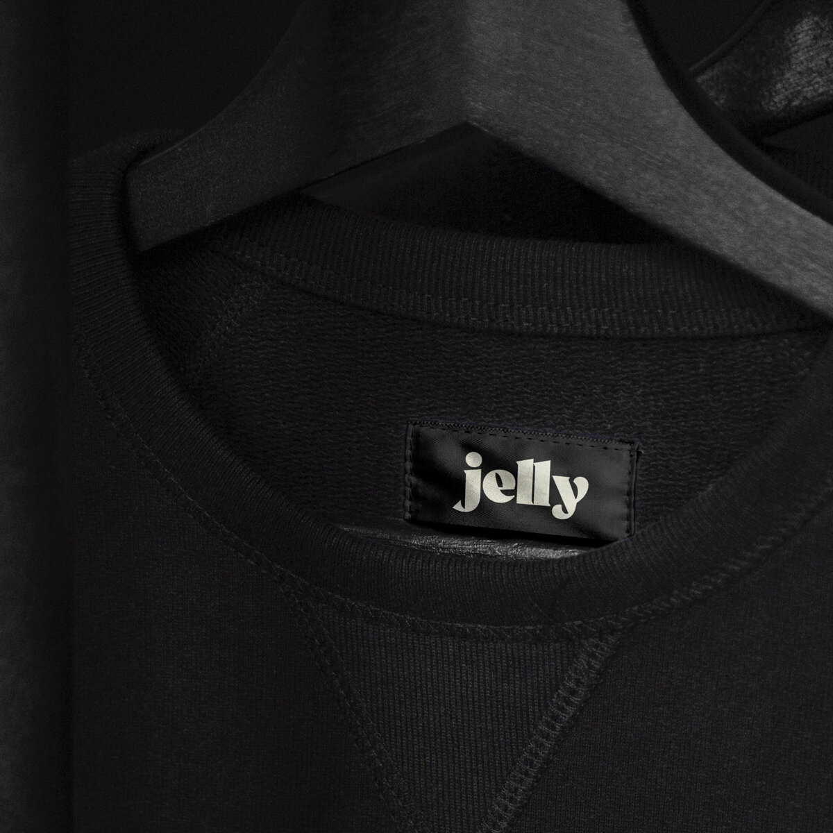 Mock up of Jelly label in black jumper