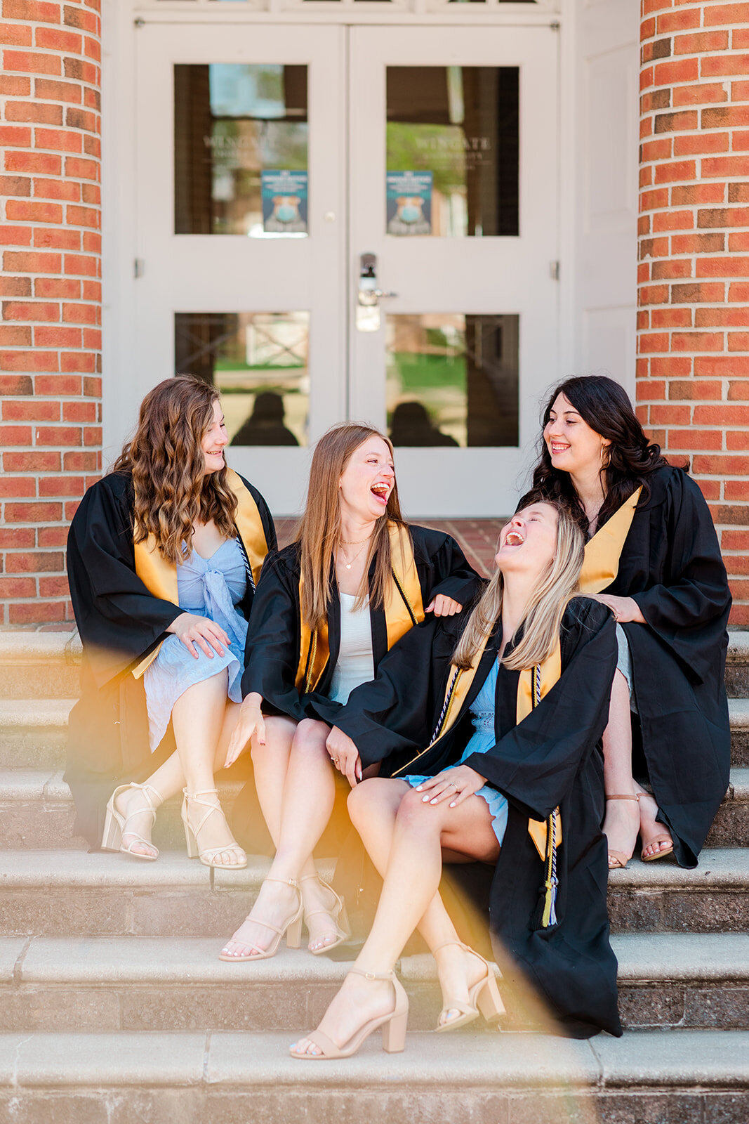 Group of friends smiling during senior session at Wingate