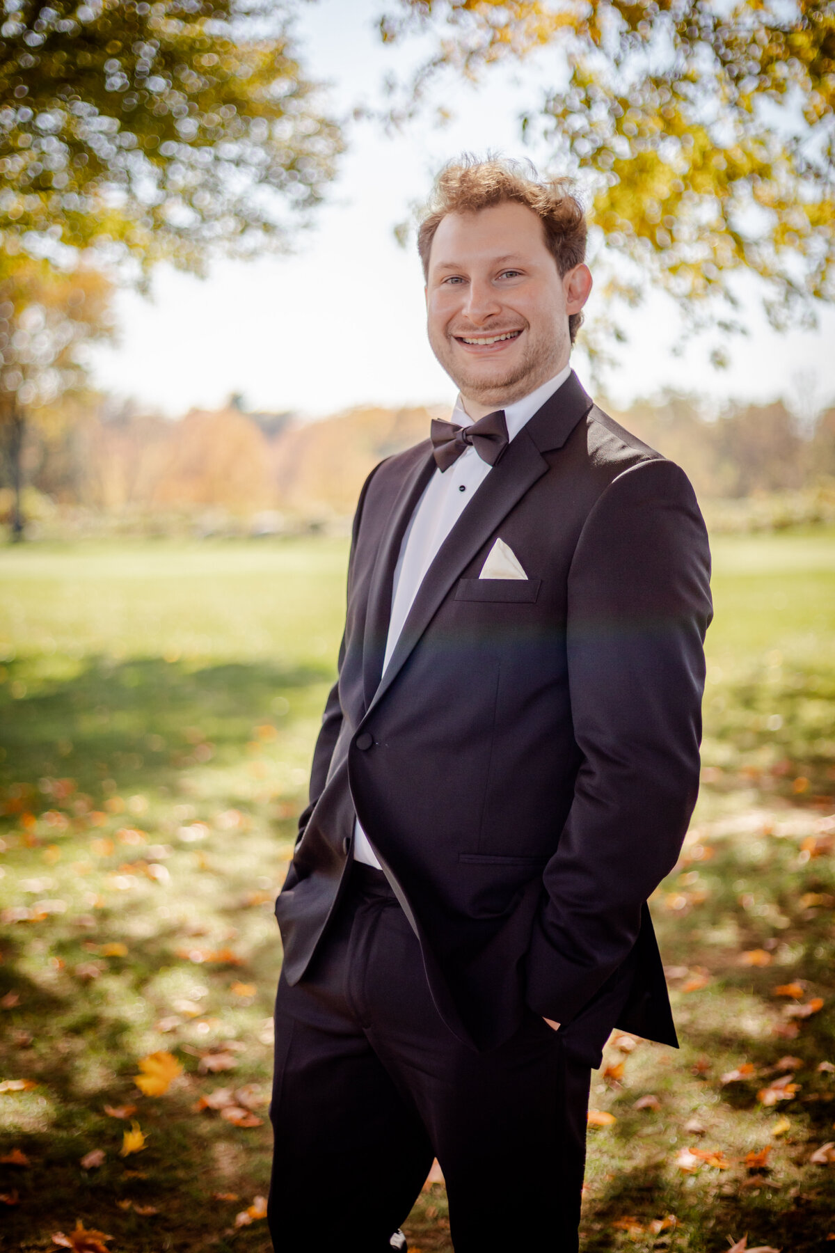 a portrait of a groom on his wedding day.