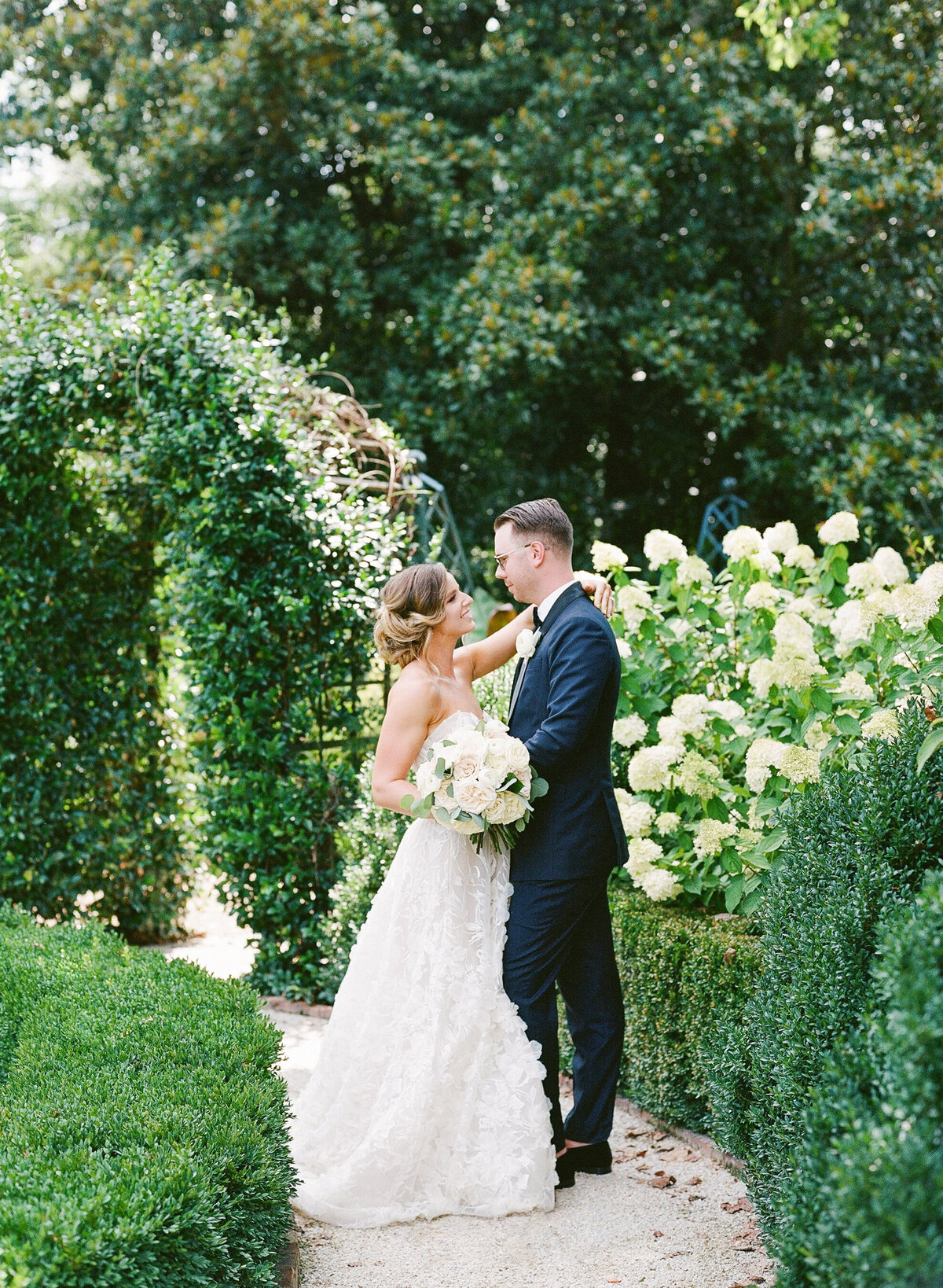 Bride and Groom in French inspired summer editorial shoot at the Duke Mansion in Charlotte, NC