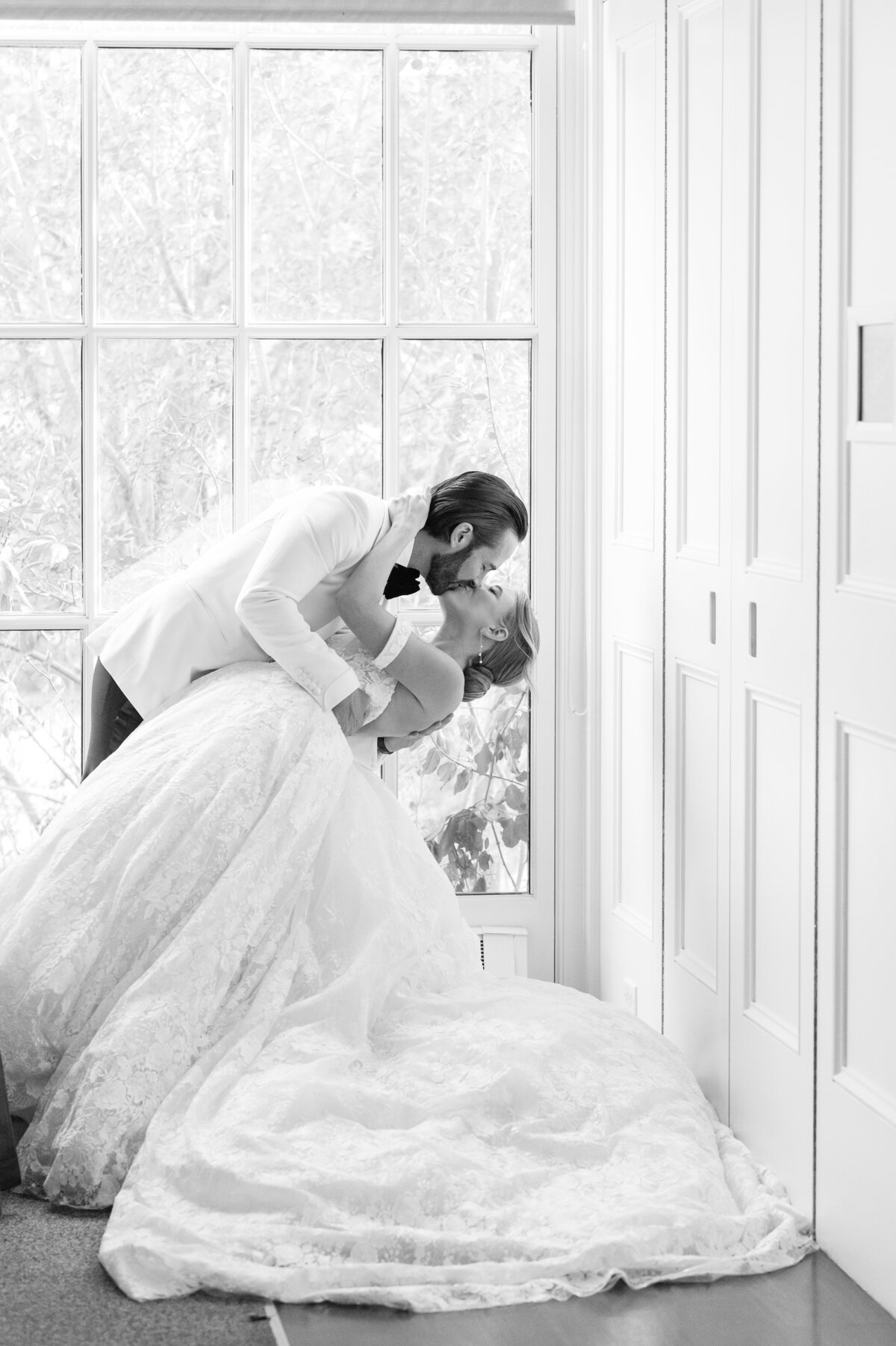 Bride and groom dip kissing at Langdon Hall