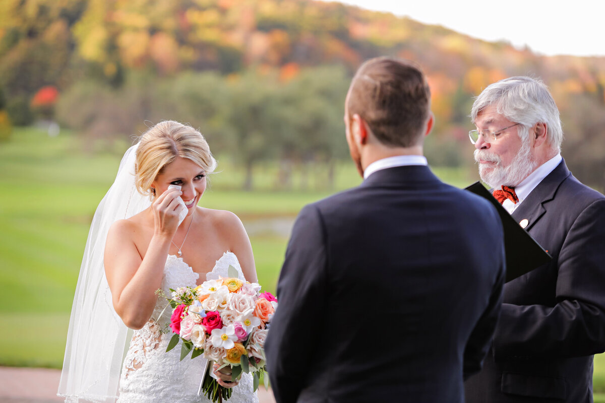 Bride crying during ceremony