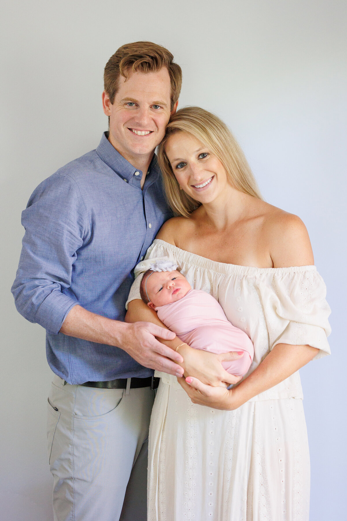 Couple holding a baby