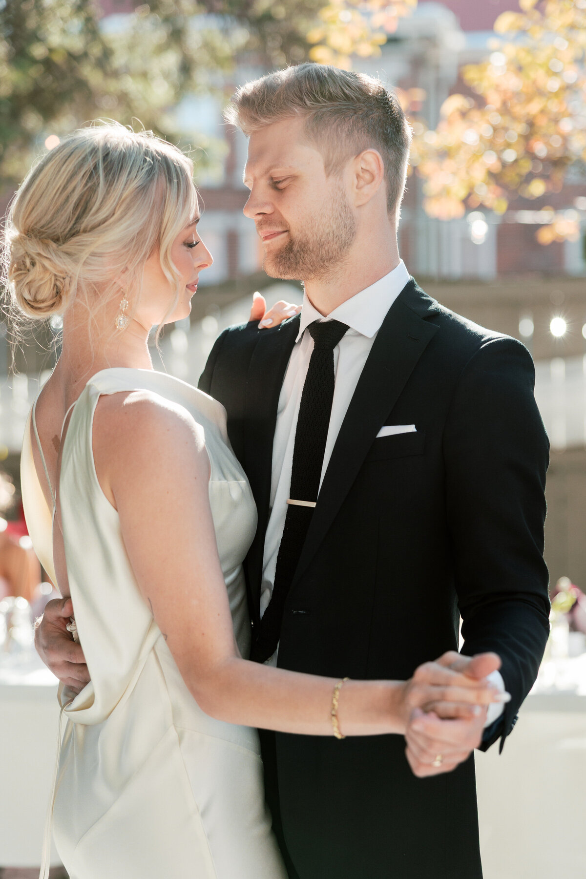Bride and groom share a moment at Dayton, Ohio wedding, captured by Philadelphia photographer.