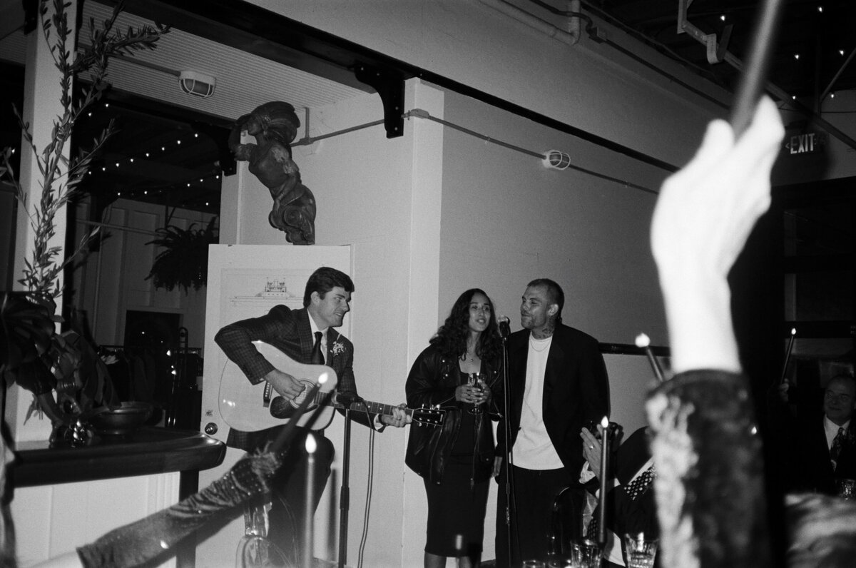 Live band at guests waving candles at the MV Skansonia in Seattle.