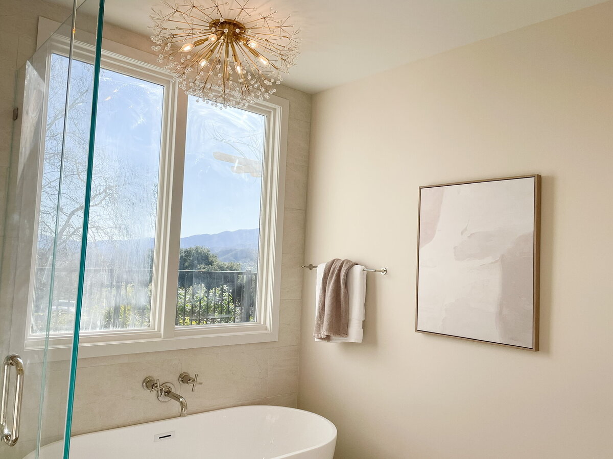 bath tub under window