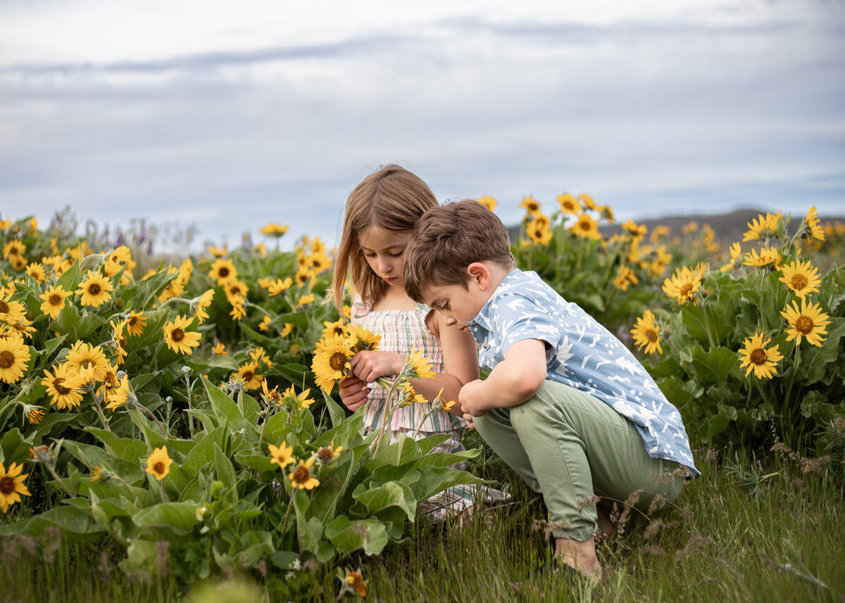 Siblings in Oregon wildflower field.