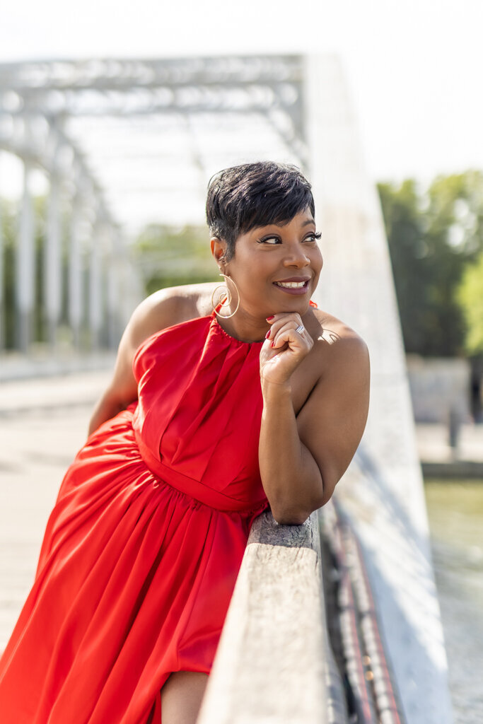 Elegant close up portrait photography featuring woman in red dress