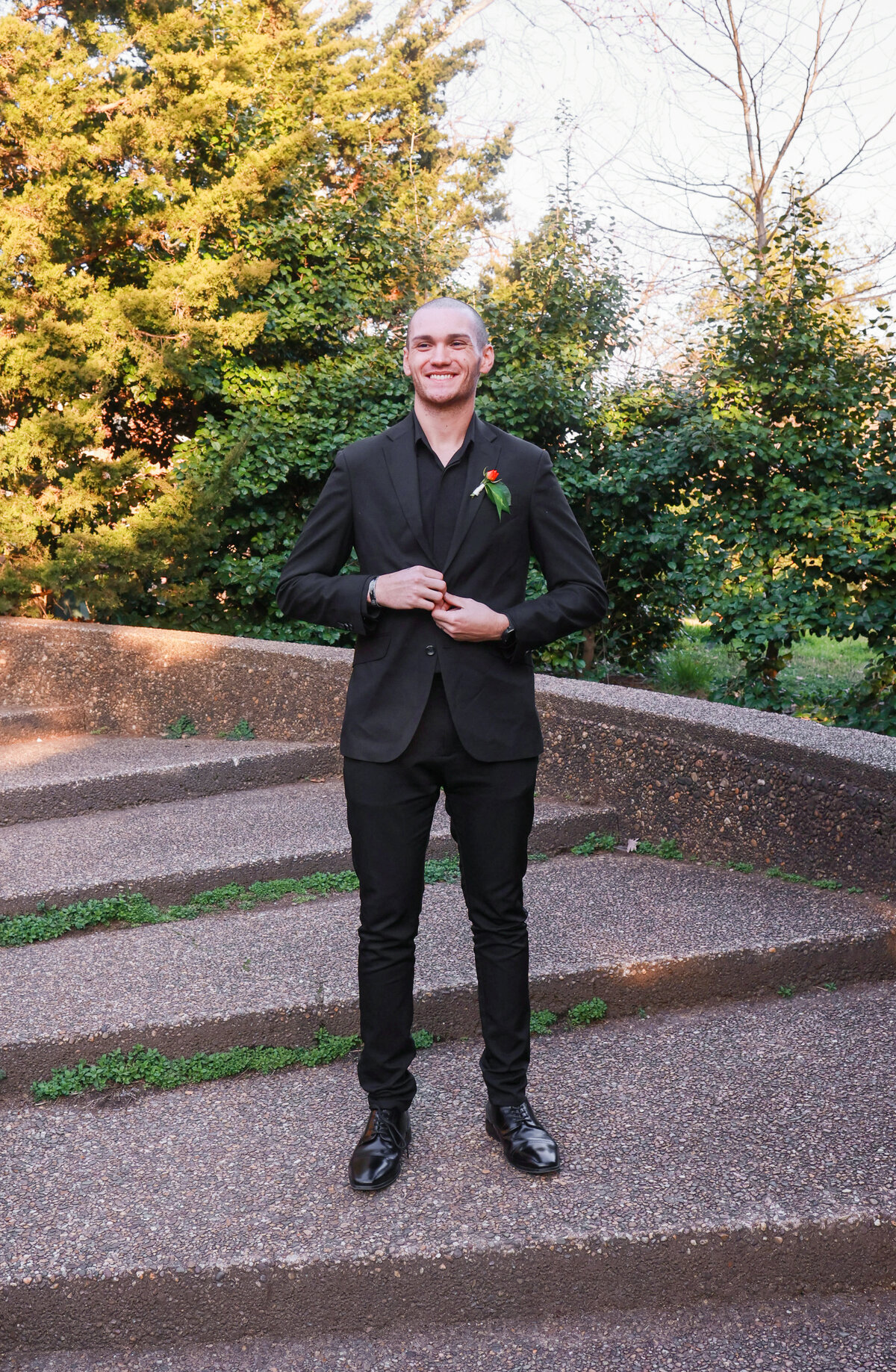 groom standing on stairs in Atlanta Georgia by Georgia wedding photographer Amanda Richardson Photography