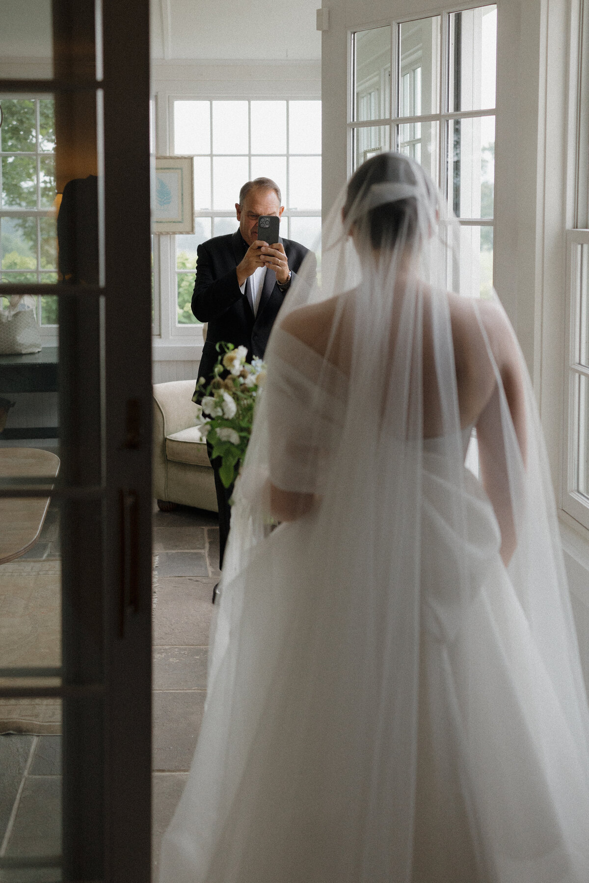 Sophisticated film photography portrait showcasing editorial wedding photography at Connecticut luxury destination venue. Lauren Alatriste's fashion photography background creates timeless imagery that balances artistic vision with genuine celebration emotion.