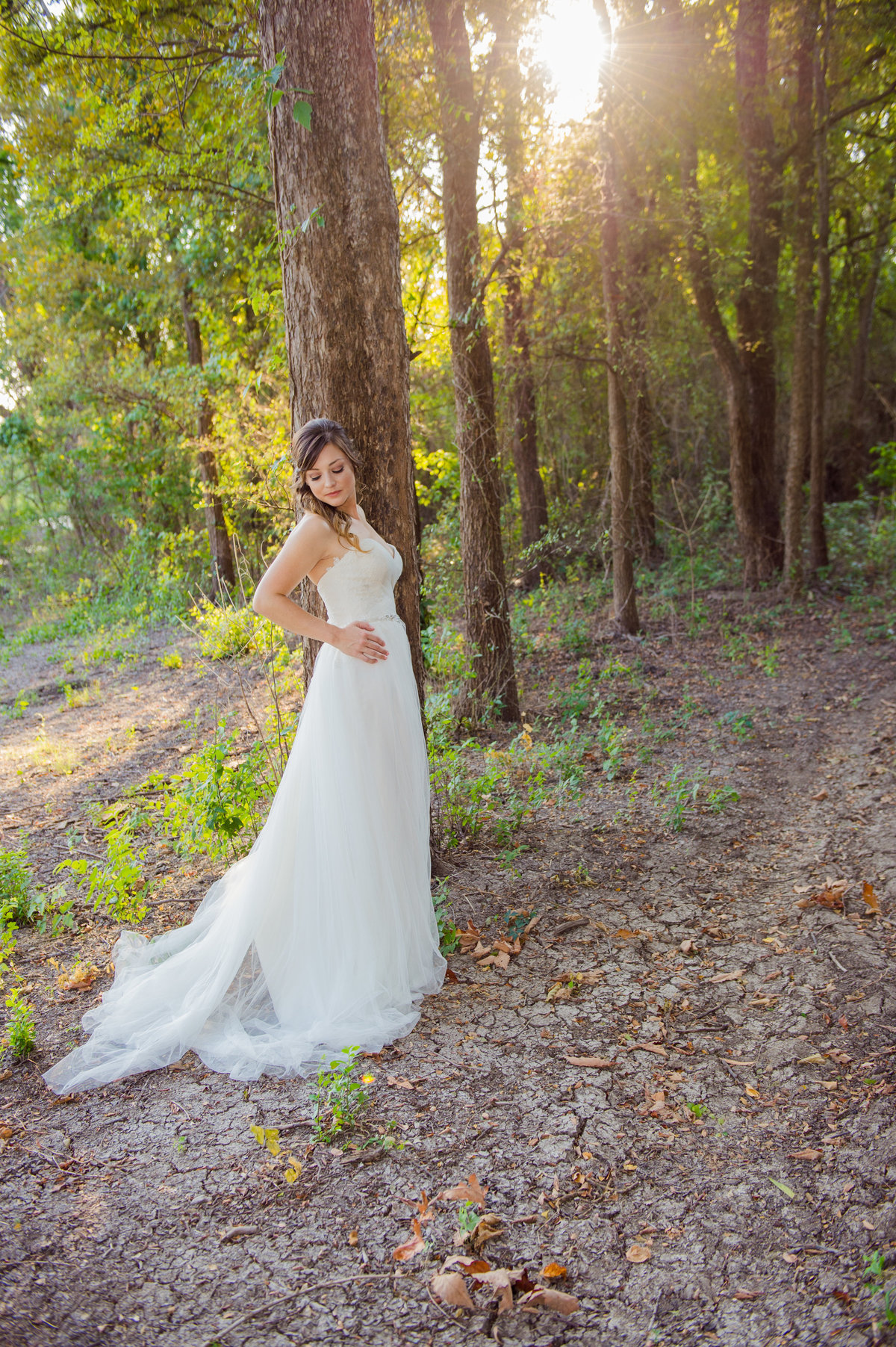 Bride in the woods by Brittany Barclay Photography