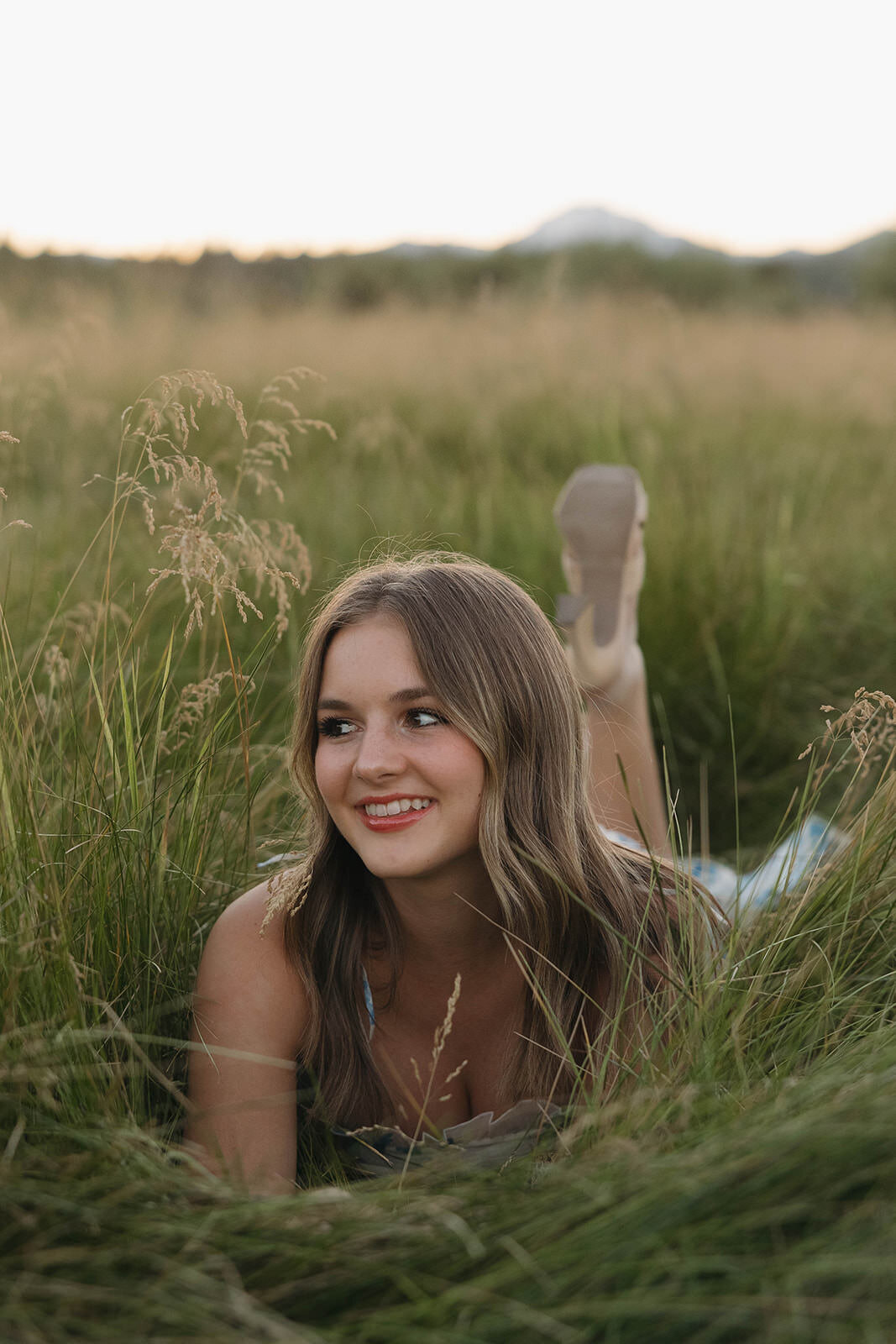 Senior girl smiling outdoors