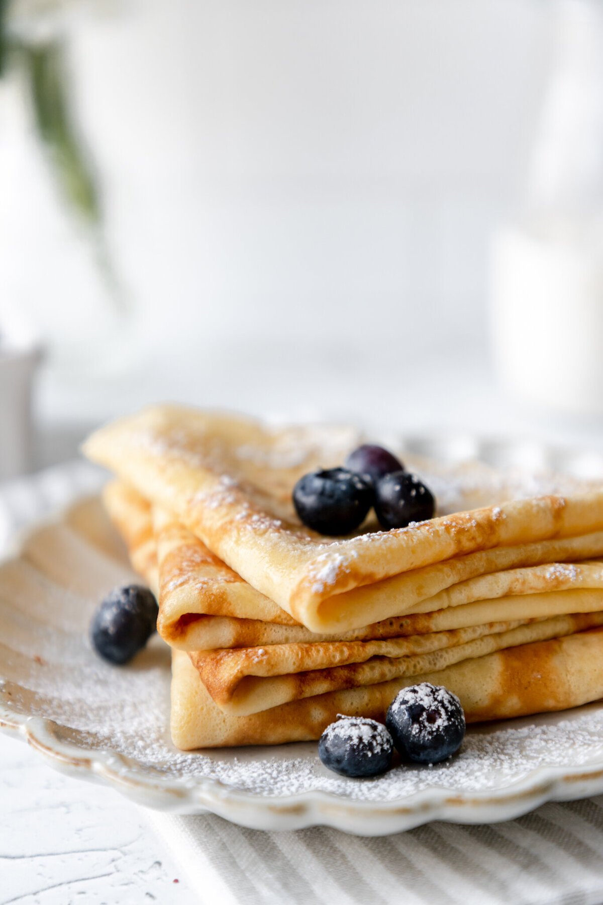 crepes topped with blueberries