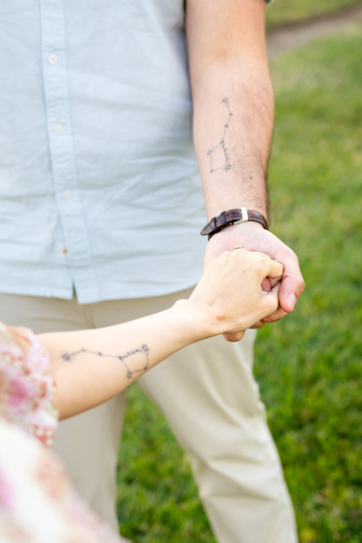 Couple holding hands with matching constellation tattoos during outdoor maternity session — Bay Area Maternity Portfolio - Ellobelle Photography
