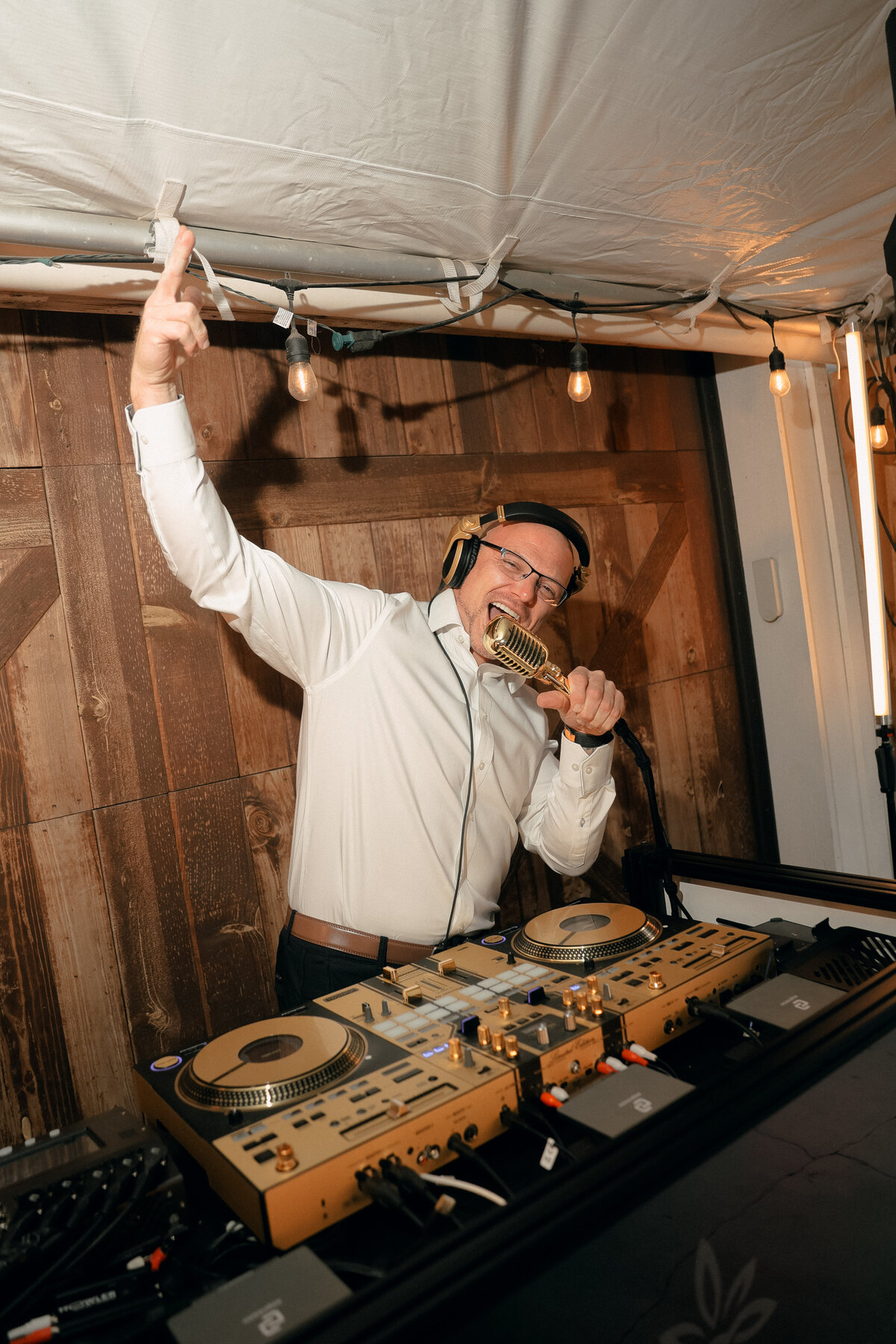 DJ Entertaining Guests at Rustic Barn Reception | Oregon Wedding Reception Photography