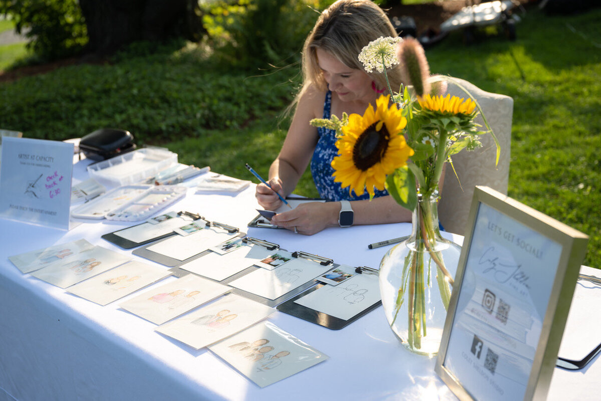 Live Guest Portrait Artist photo by Johnson Photography
