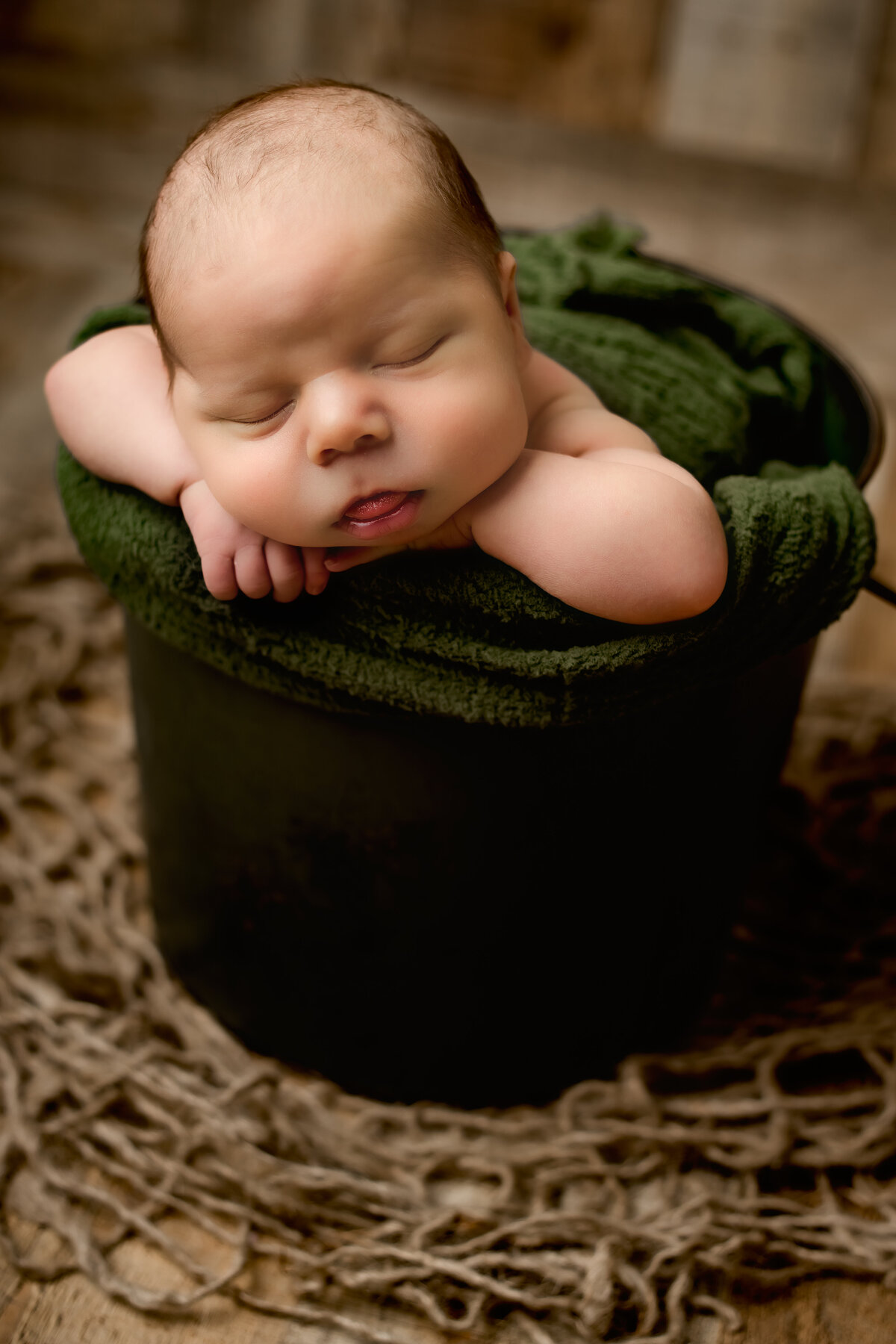 Spring, Tx little boy sleeping in a bucket photoshoot