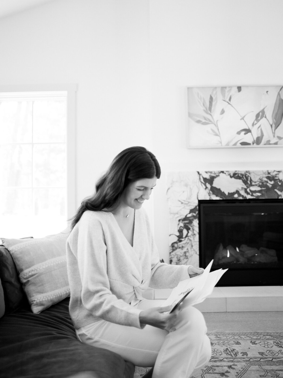 relaxed designer works at Fernhaus, Northern Michigan, film branding photos for designer, interior