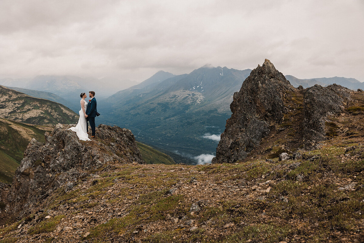 A beautiful couple celebrating their elopement at sunset in Big Sur, California. Captured by a top California elopement photographer.
