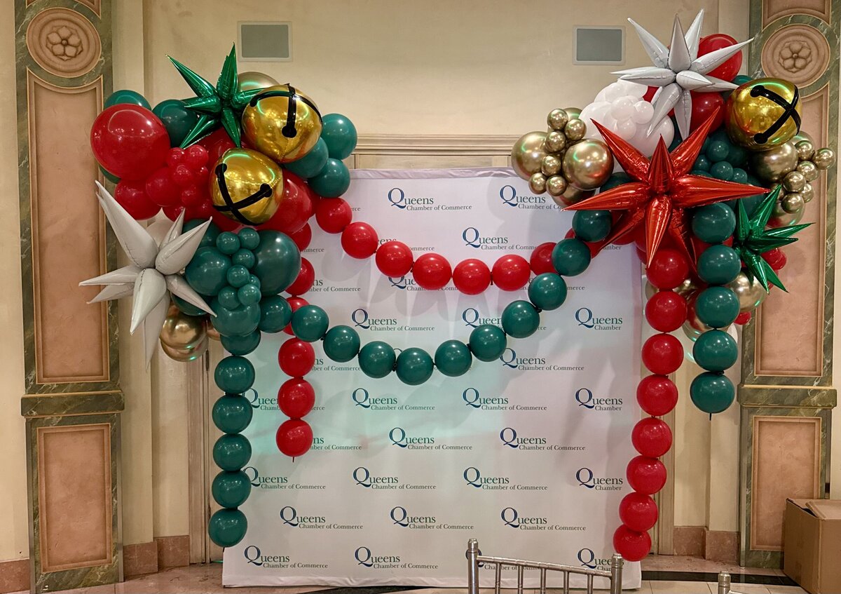 Holiday Balloons on step and repeat