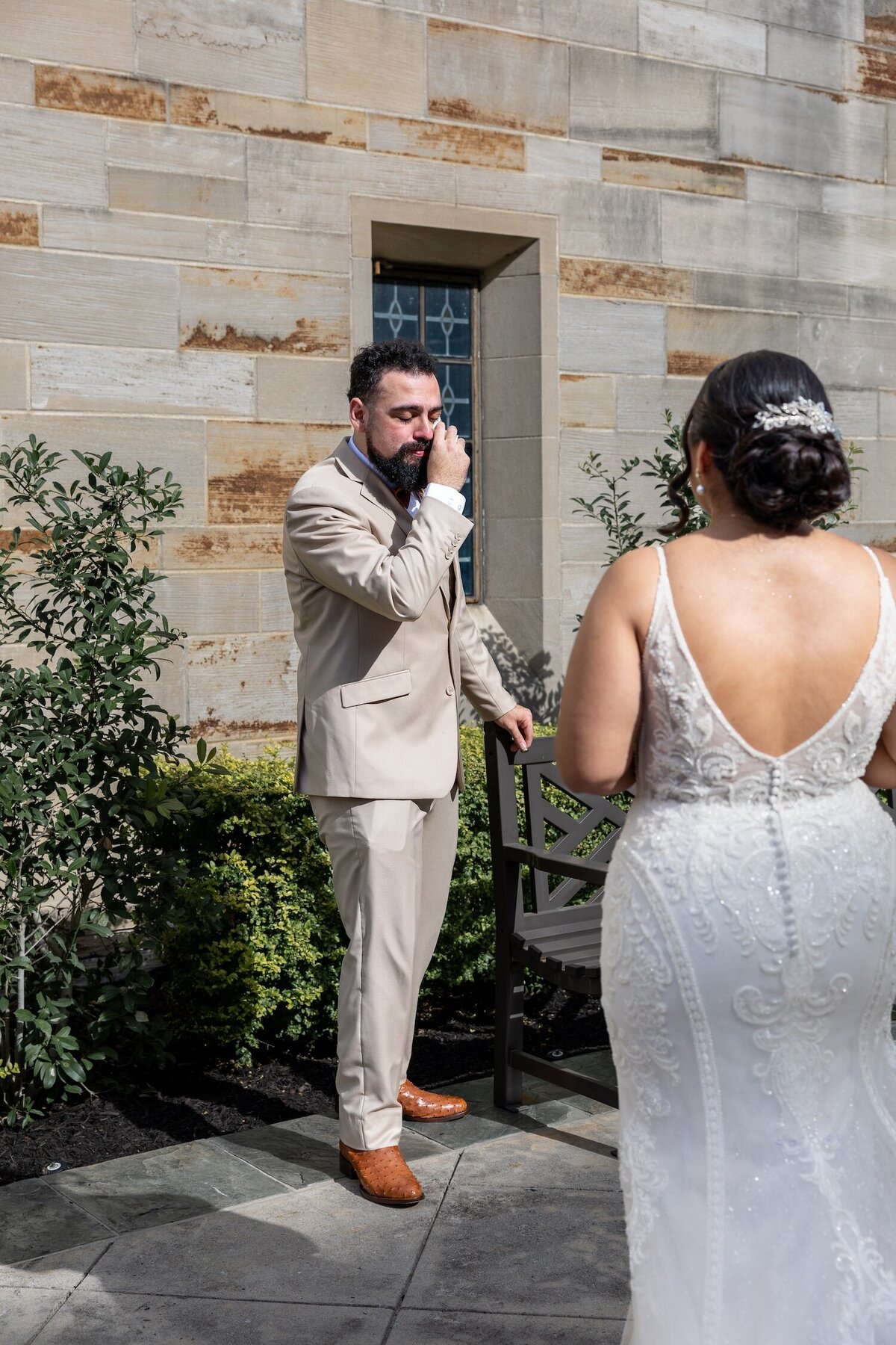 Groom's emotional reaction to bride during first look