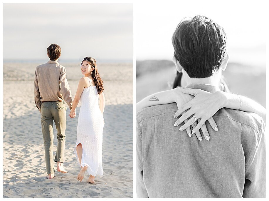 couple walking and hugging in sand