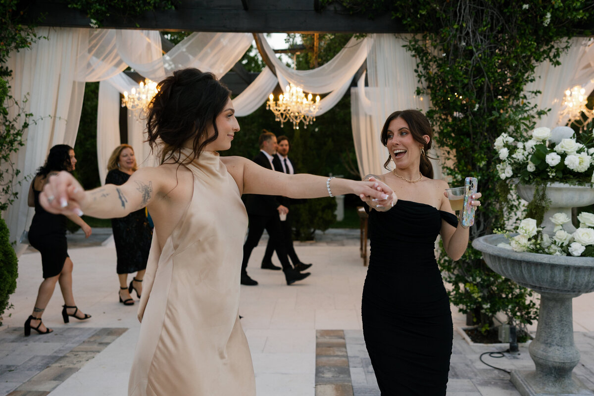 bridesmaids dancing during reception at La Casa Toscana Wedding Venue Fort Myers Florida