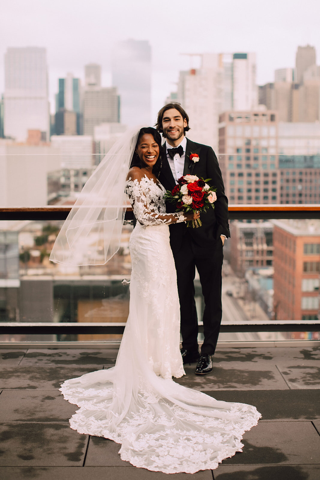 Bride and groom smile on Hyatt House Chicago Rooftop wedding