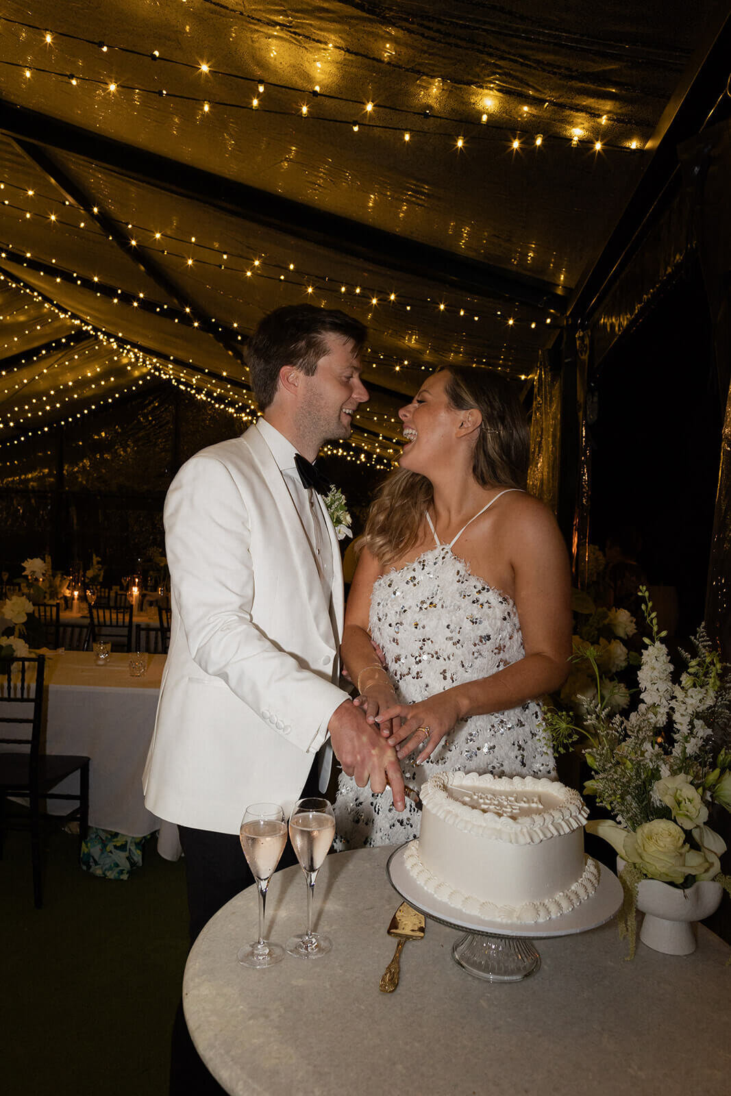 Couple cut wedding cake on their wedding day 