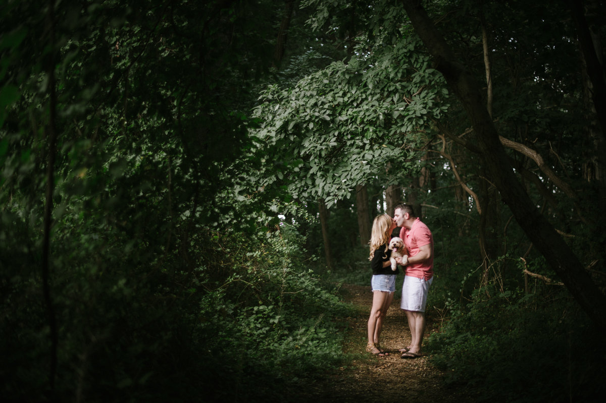 new jersey engagement love kiss dramatic light forest woodland natural setting