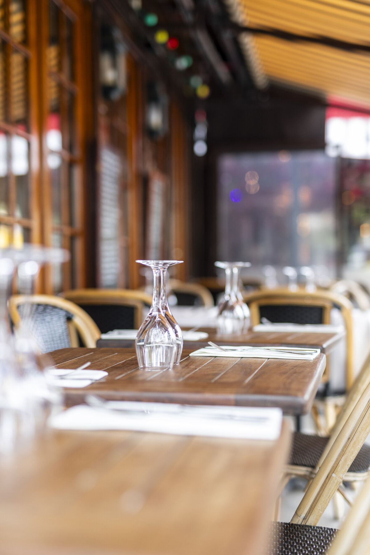 A table setting outside  a cafe on a spring day.