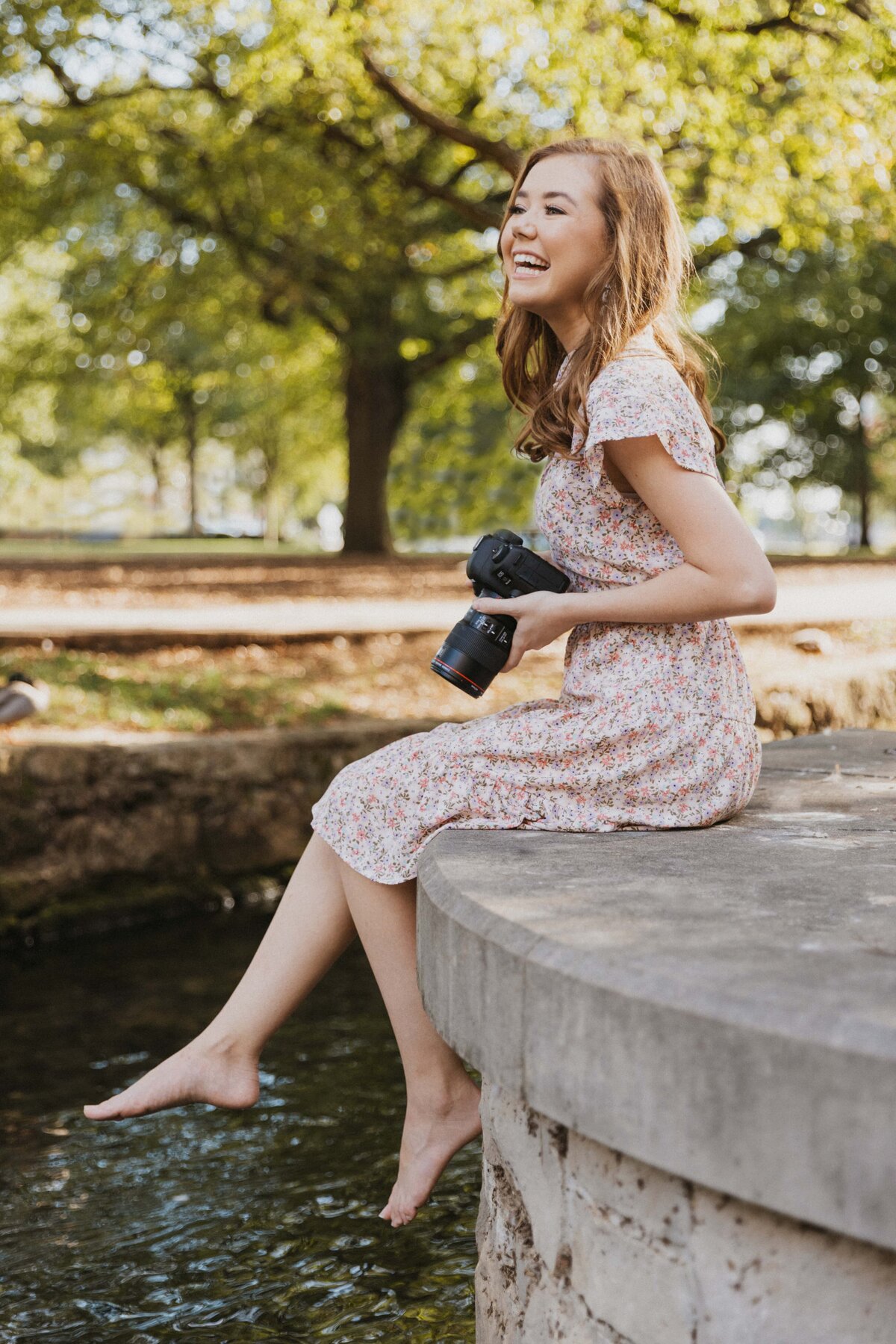 woman smiling with camera