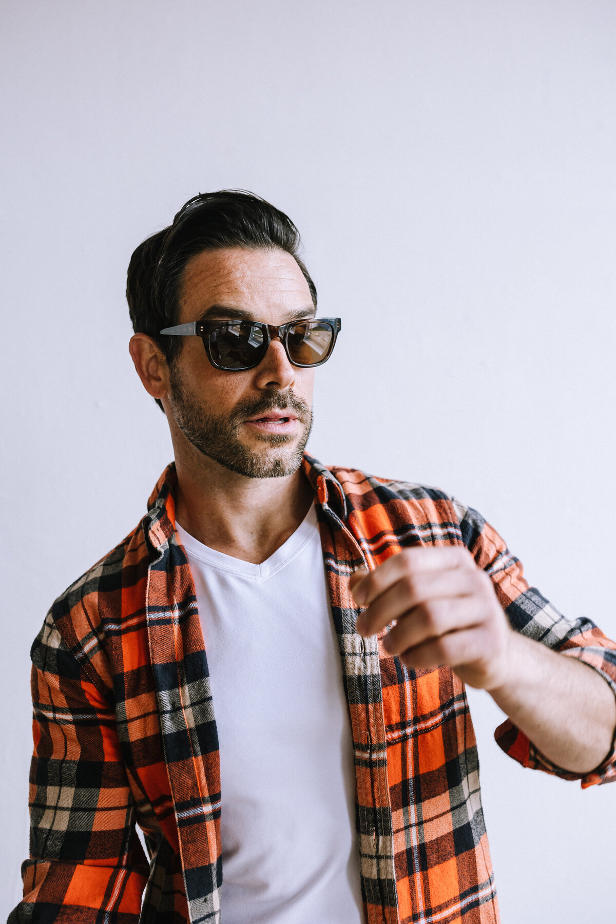 Man wearing glasses for branding photos for North Point Eyewear of Pittsburgh. 