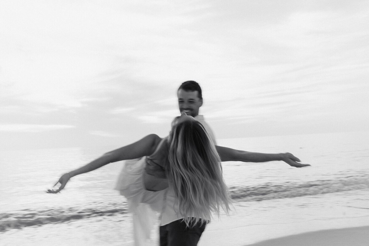 Couple on beach taken by film wedding photographer, Shelby Ann Photos