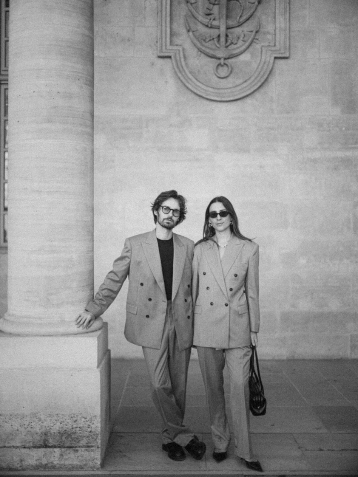 Engagement session at the Tuileries and Louvre in Paris, with a couple walking through the gardens under the morning light.