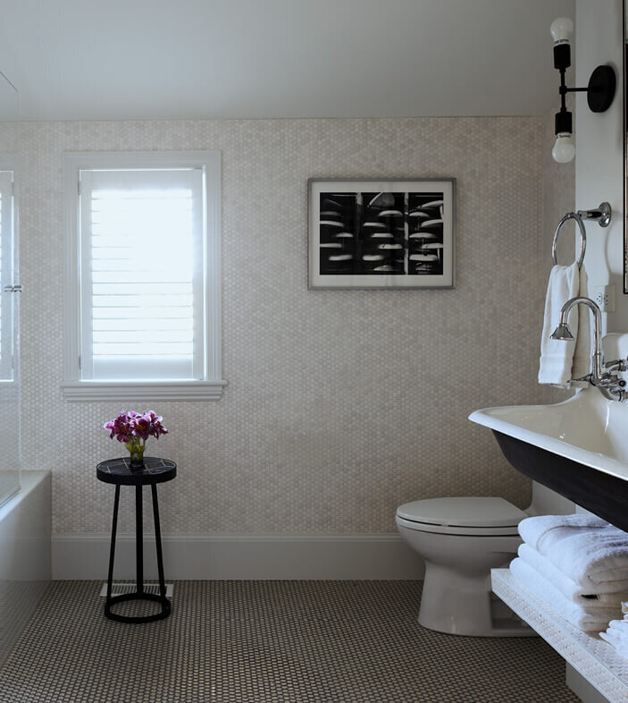 Kids bathroom design by a Hingham interior design firm at a historic home renovation project, blending playful elements with timeless, functional style.