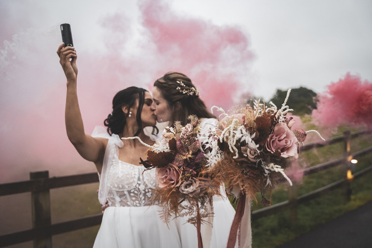 Smoke canons with their bridal party